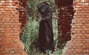 Dreaming of Black Cloaked Man – Are You in Danger