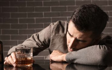 Spiritual Meaning of Drinking Alcohol in a Dream - Are You Celebrating or Washing Pain